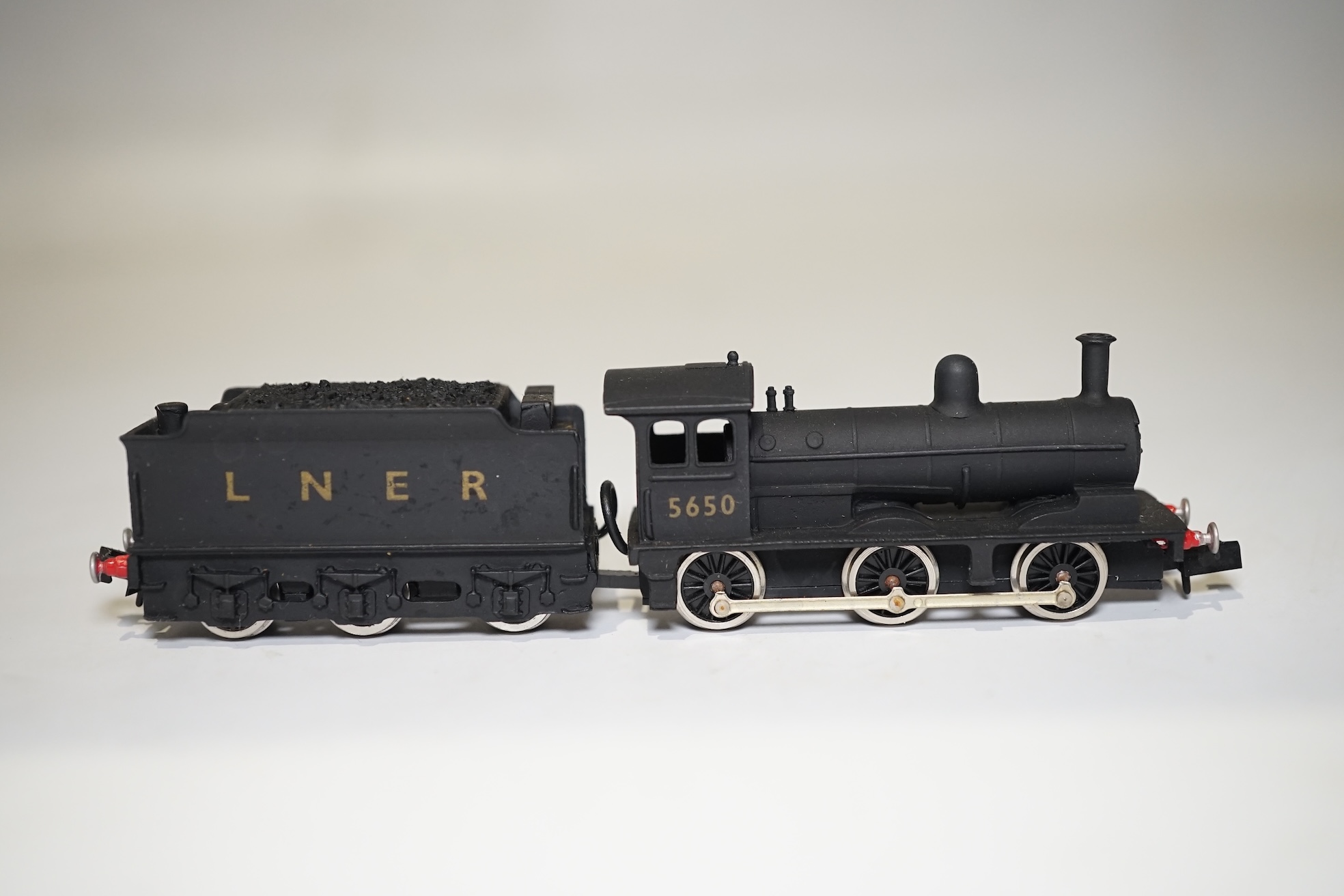 Three boxed Union Mills Models N gauge railway LNER locomotives; a Class B12, 1565, a Class Q2, 3359, and a Class J25, 5650. Condition - good.